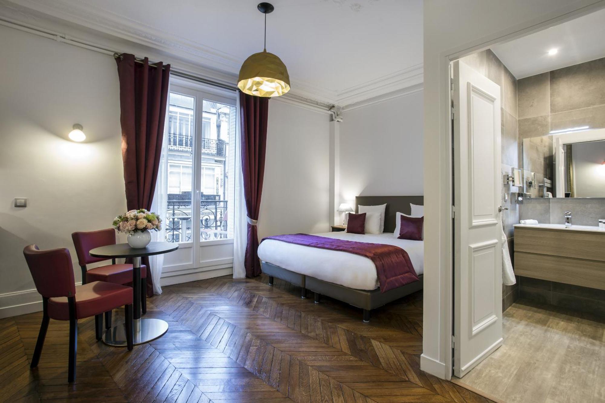 Suite mit Kingsize-Bett und Balkon